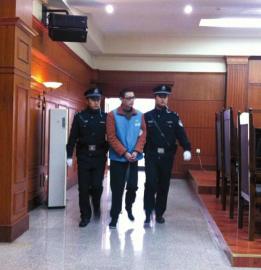 趙勇被帶上法庭。