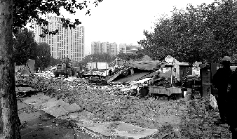 對公園選址的5.5萬多平方米的違章建筑進行拆除。