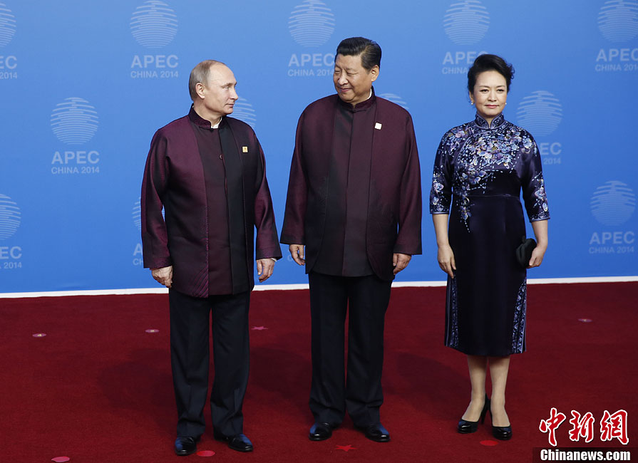 圖為習(xí)近平夫婦歡迎俄羅斯總統(tǒng)普京。中新社發(fā) 杜洋 攝